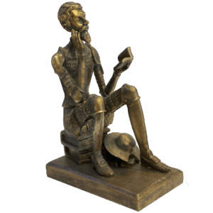 Figura Quijote leyendo